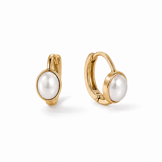 Luna Pearl Huggie Earrings on white background