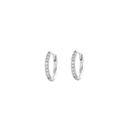 Celeste Mini Pavé Huggie Earrings on white background