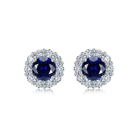 Blue Sapphire Halo Stud Earrings on white background