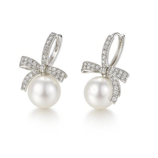 Pearl Bow Drop Earrings on white background