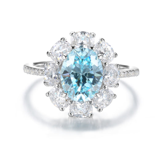 Oval Light Aquamarine Flower Halo Ring on white background