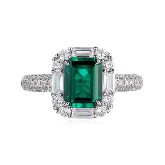 Emerald Halo Ring on white background