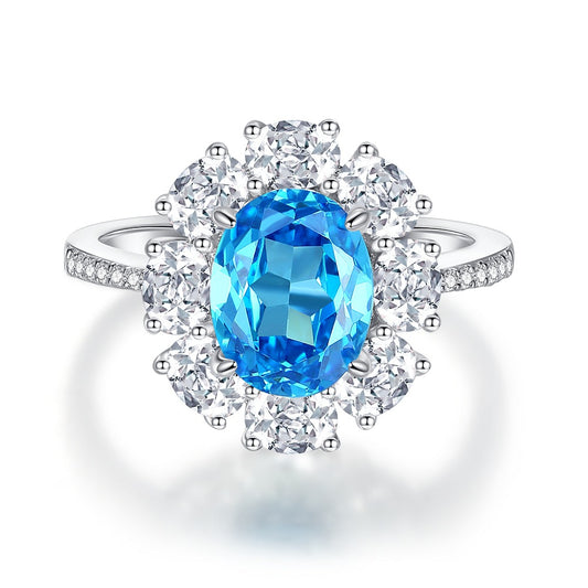 Oval Aquamarine Halo Ring on white background