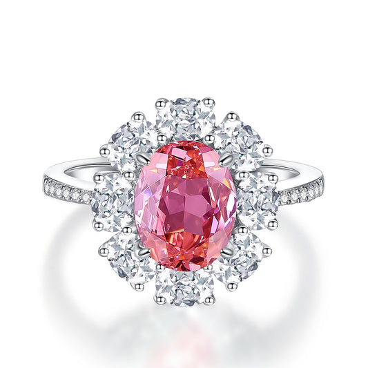 Padparadscha Sapphire Floral Halo Ring on white background