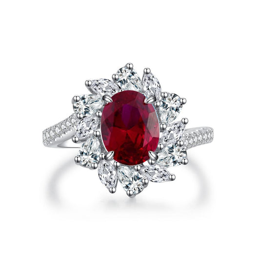 Oval Ruby Flower Halo Ring on white background