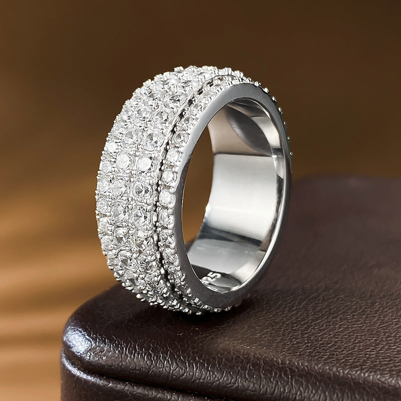 Aeterna Jewelry wide full pav¨¦ diamond band ring on leather surface