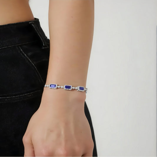 Model wearing sapphire trio adjustable bracelet by Aeterna Jewelry
