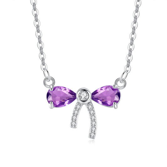 Amethyst Bow Pendant on white background