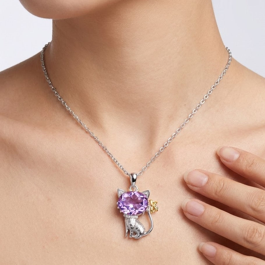Amethyst cat pendant necklace worn on model neck in sterling silver