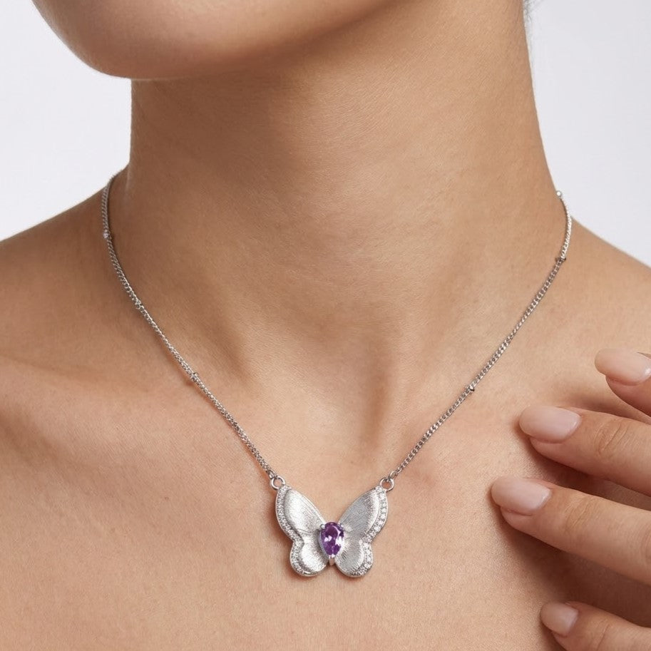 Model wearing amethyst butterfly necklace in sterling silver