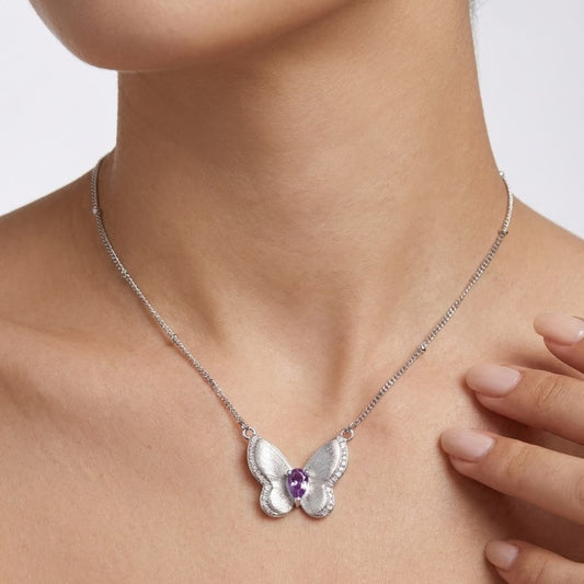 Model wearing amethyst butterfly necklace in sterling silver