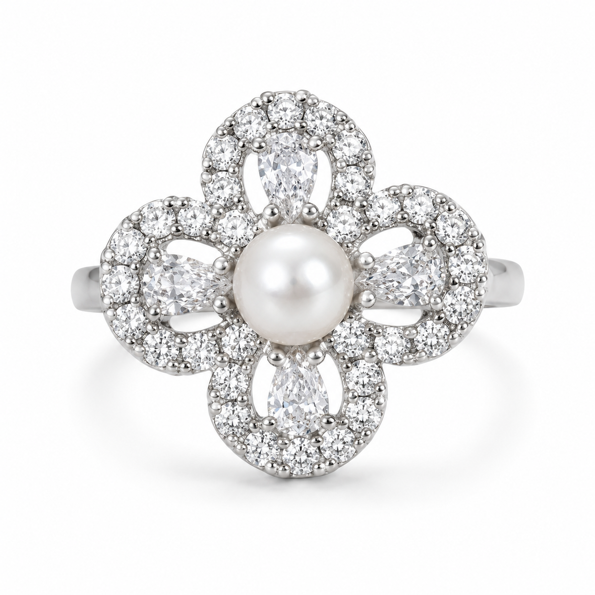 Front view of Aurelia Pearl Clover Statement Ring with a freshwater pearl centre and clear cubic zirconia four-petal setting on a white background