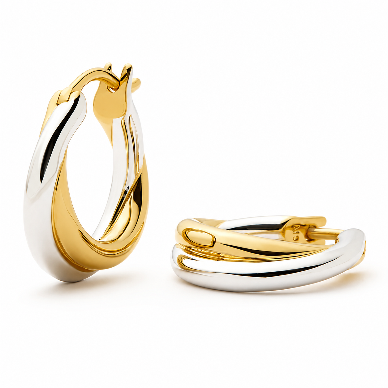 Front product view of sculpted two-tone hoop earrings with mixed gold and silver tones on a white background