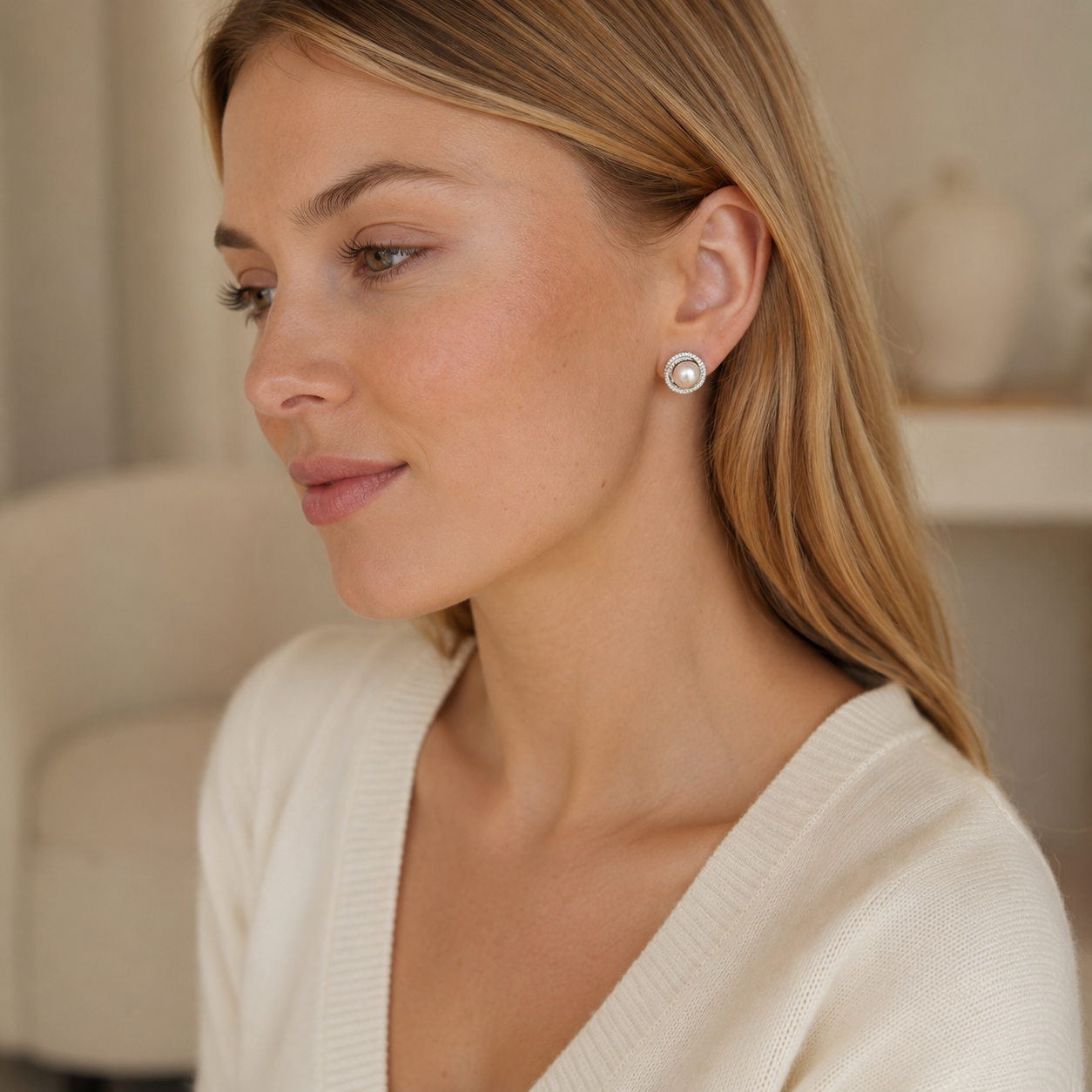 Model wearing silver pearl halo stud earrings