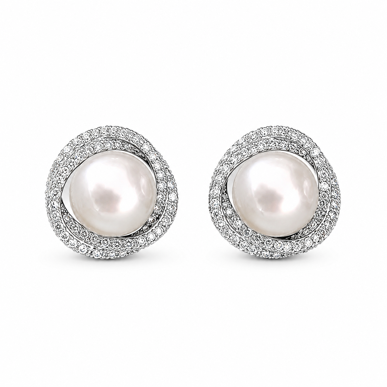 Silver pearl halo stud earrings on white background