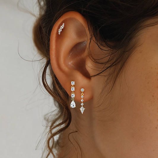 Model wearing mixed-cut cubic zirconia drop earrings