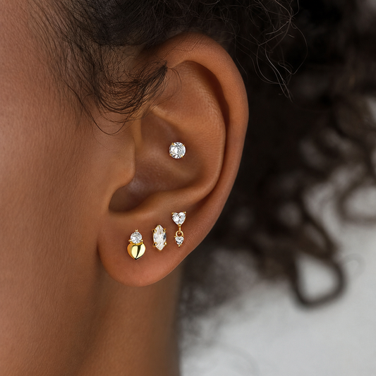 Model wearing heart and marquise cubic zirconia stud earrings