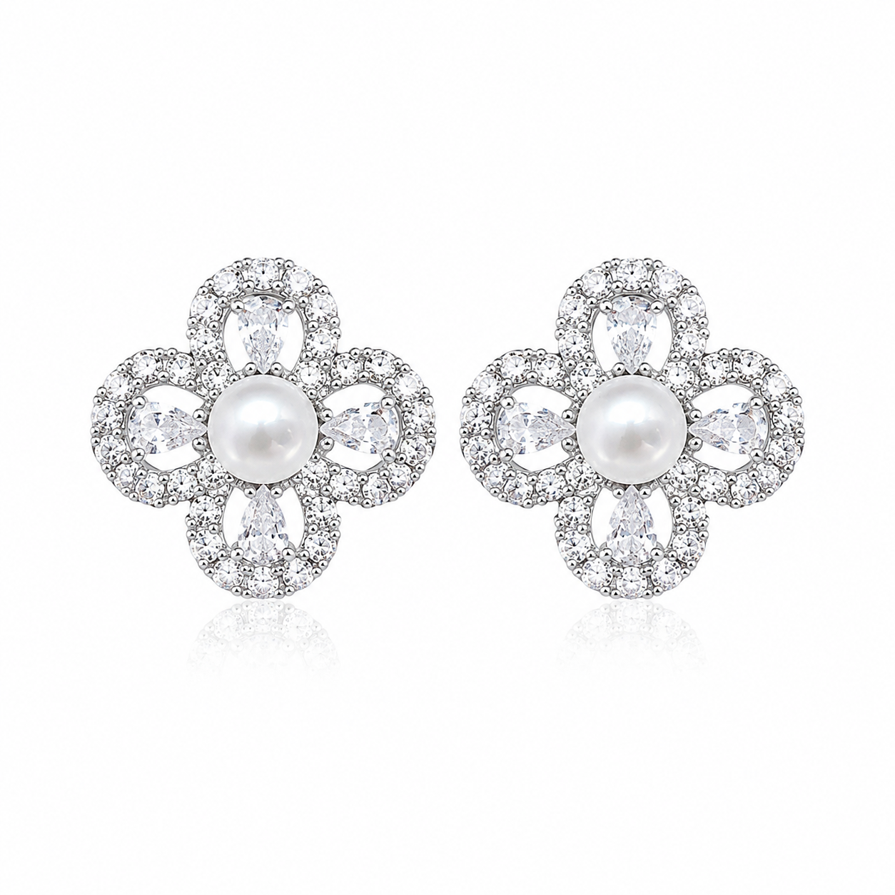 Pair of Aurelia Pearl Clover Stud Earrings with freshwater pearl centres and four stone-set petals on a white background