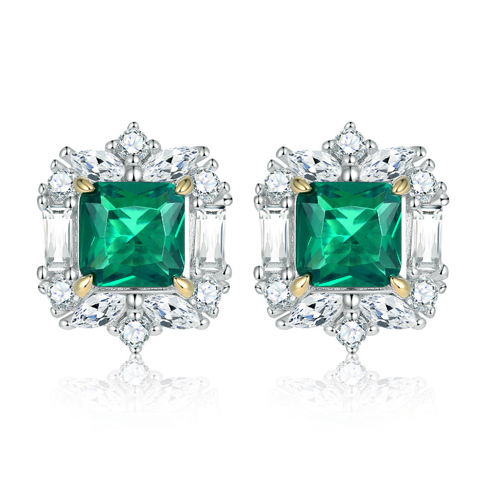 Emerald princess cut halo stud earrings in sterling silver with gold accents and white stones, square green gemstones surrounded by diamonds, Aeterna Jewelry