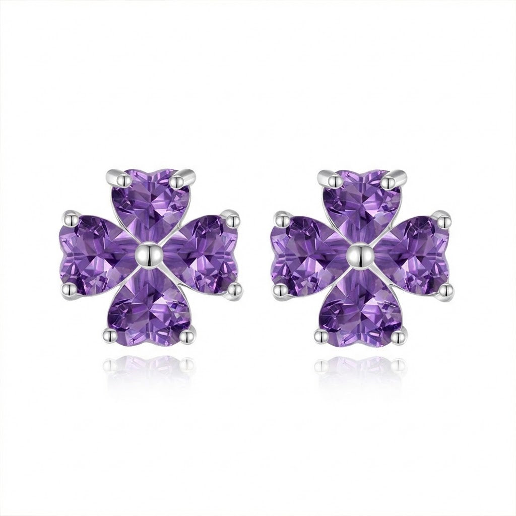 Sterling silver amethyst flower stud earrings on white background