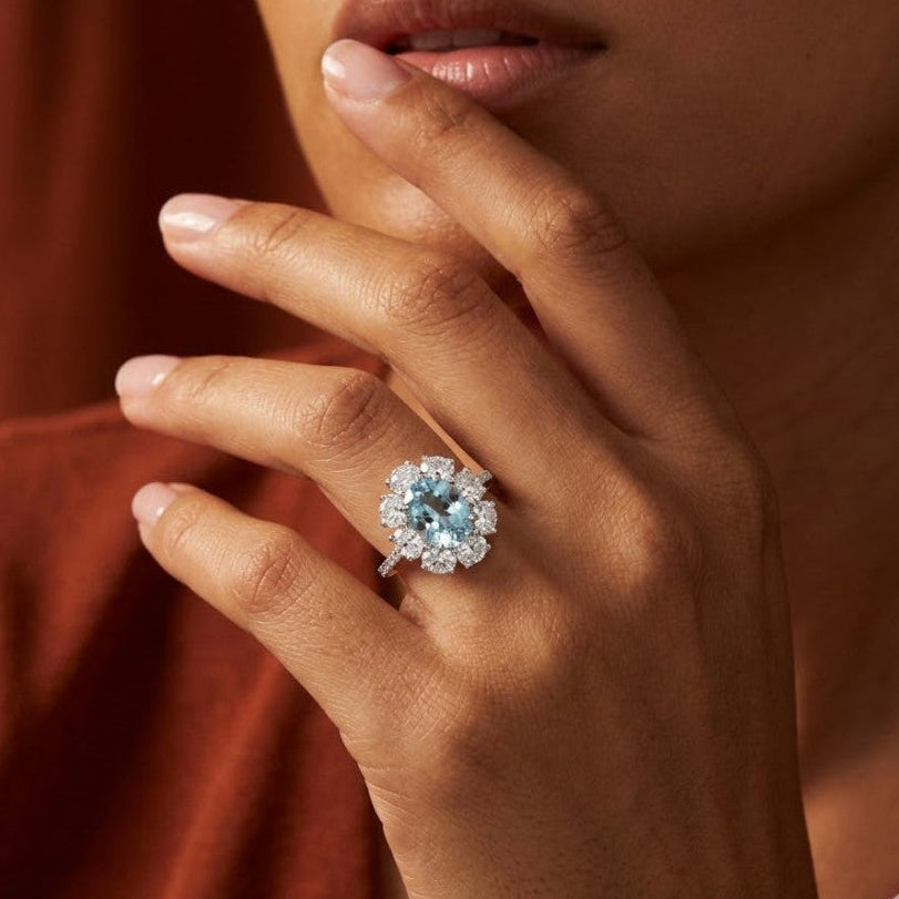 Oval Light Aquamarine Flower Halo Ring