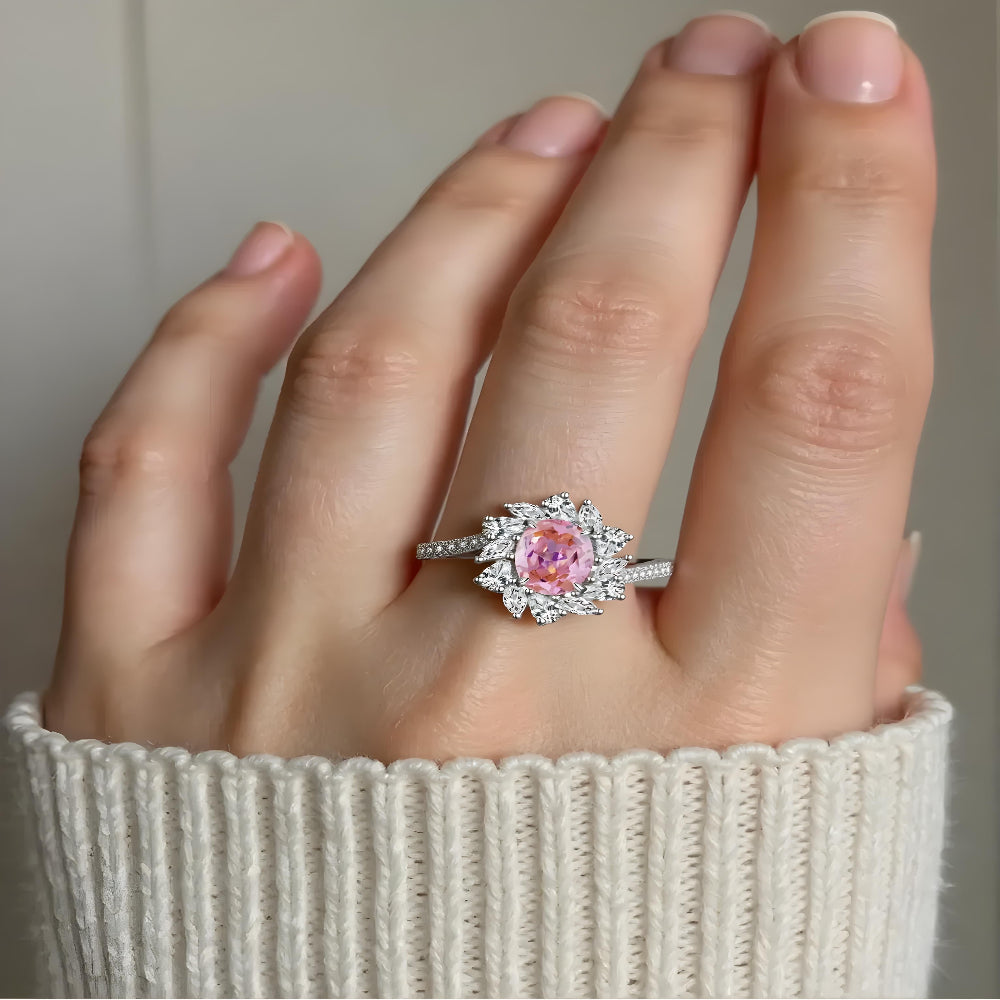 Aeterna Jewelry pink oval halo ring worn by model, elegant hand close-up