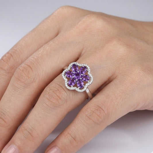 Amethyst flower cluster ring worn on hand