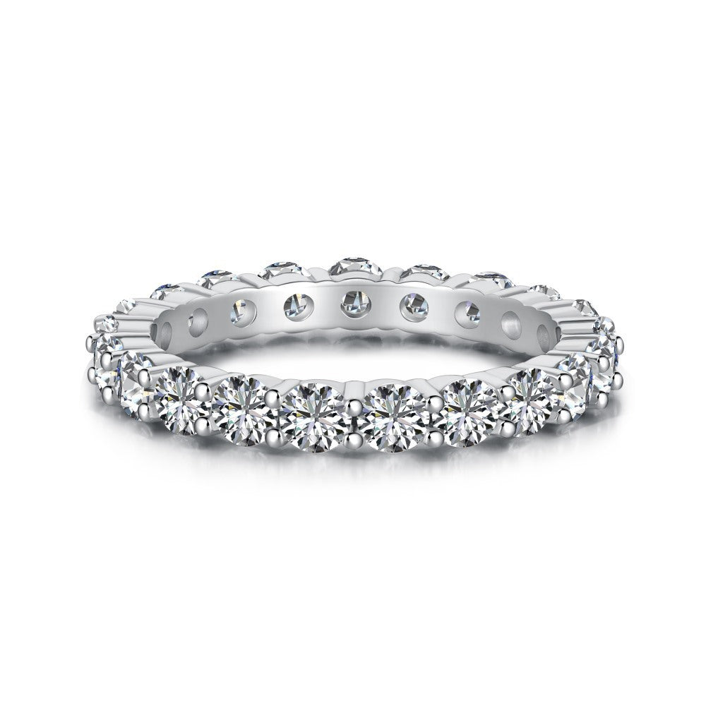 Aeterna Jewelry round-cut full eternity ring with white gemstones on white background