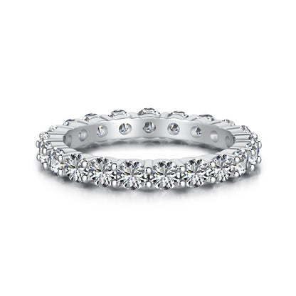 Aeterna Jewelry round-cut full eternity ring with white gemstones on white background