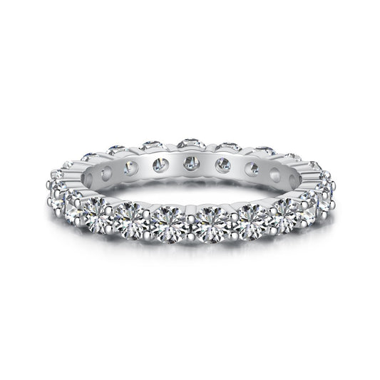 Aeterna Jewelry round-cut full eternity ring with white gemstones on white background