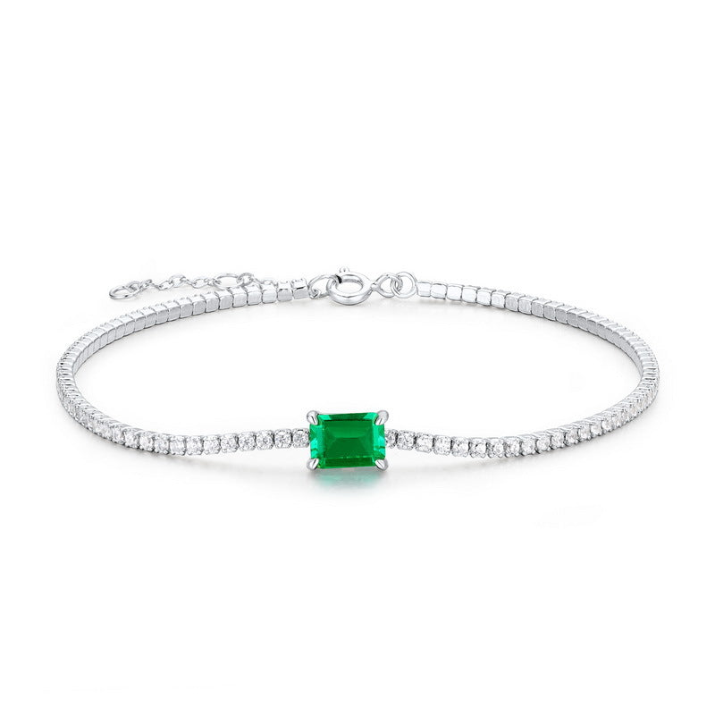 Aeterna Jewelry emerald solitaire tennis bracelet on white background