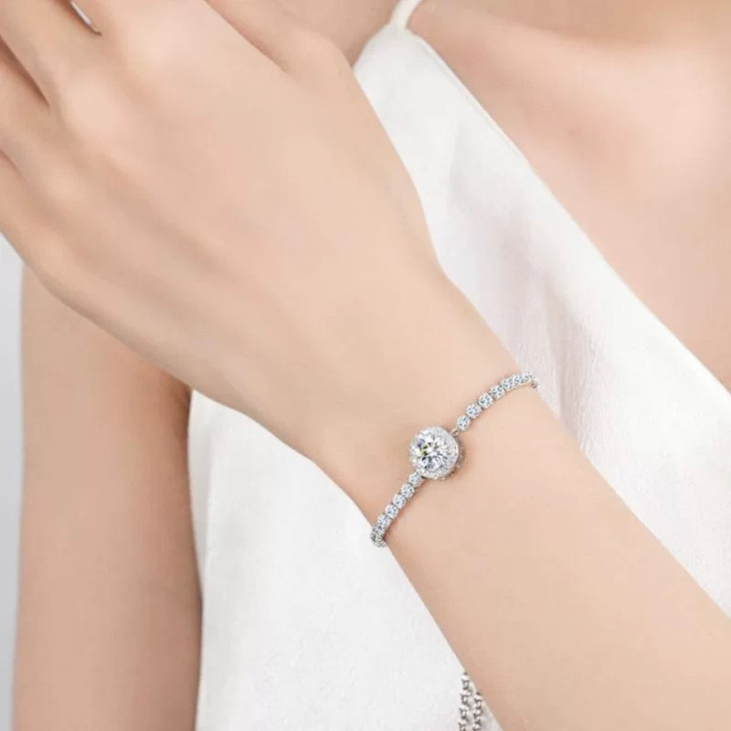 Elegant woman wearing Aeterna Jewelry halo bracelet close-up
