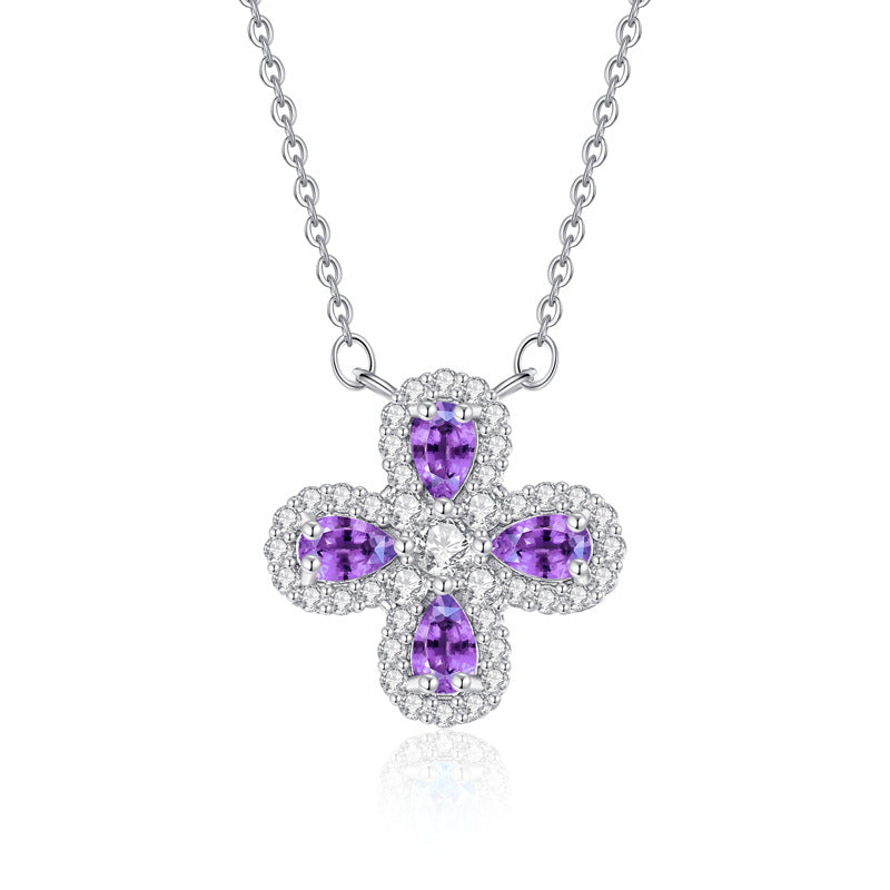 Amethyst clover pendant necklace on white background