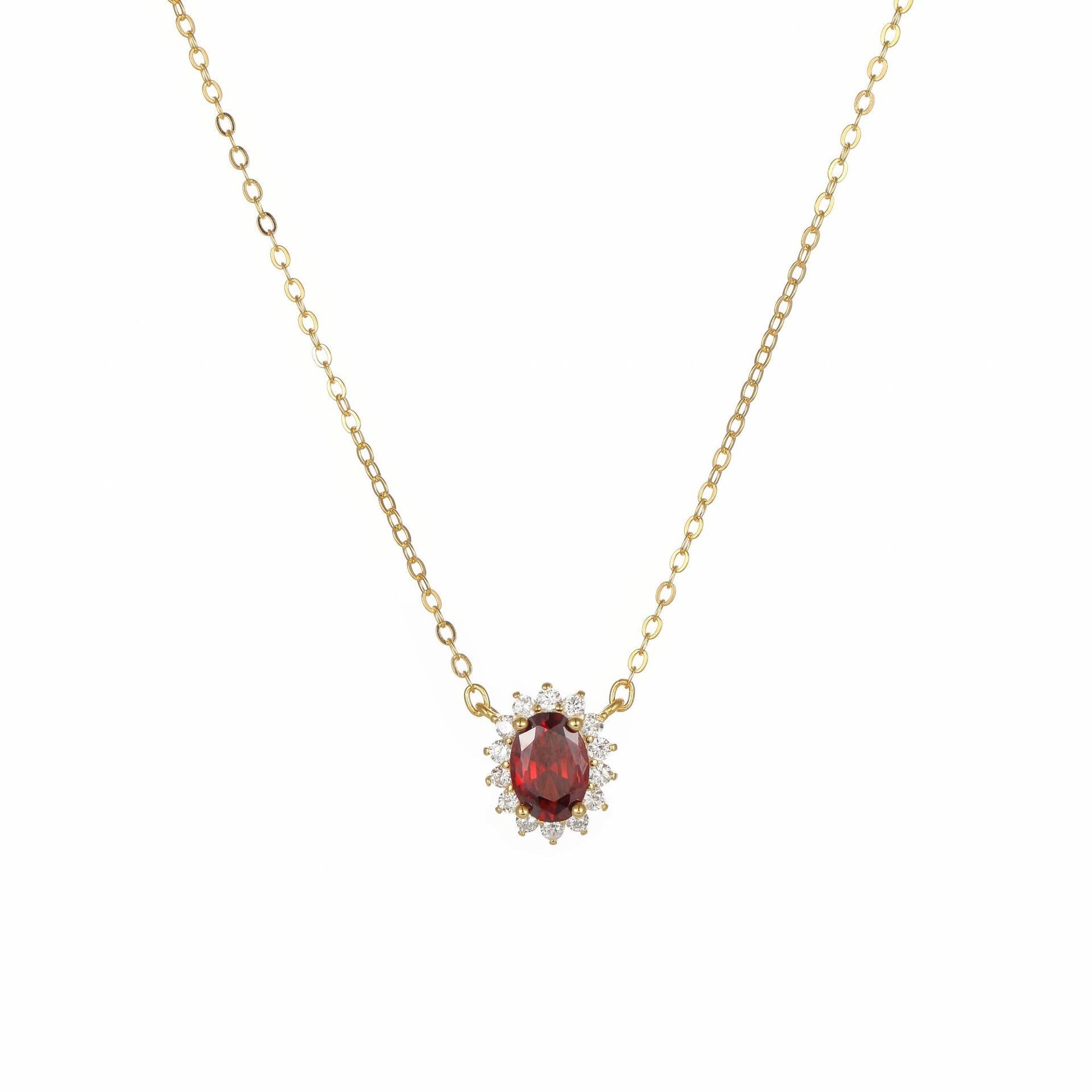 Garnet birthstone halo necklace on white background, gold-plated sterling silver